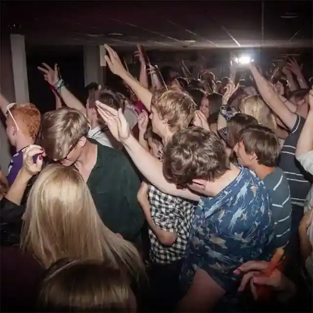 Hands Raised, Confusing Messages