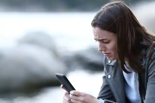 Checking His Phone