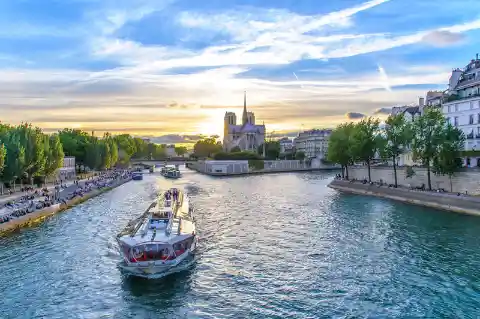 Which famous river flows through Paris?
