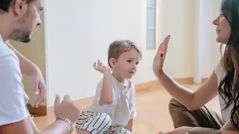 Showing The Picture To His Parents