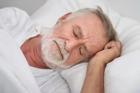 Old man in bed